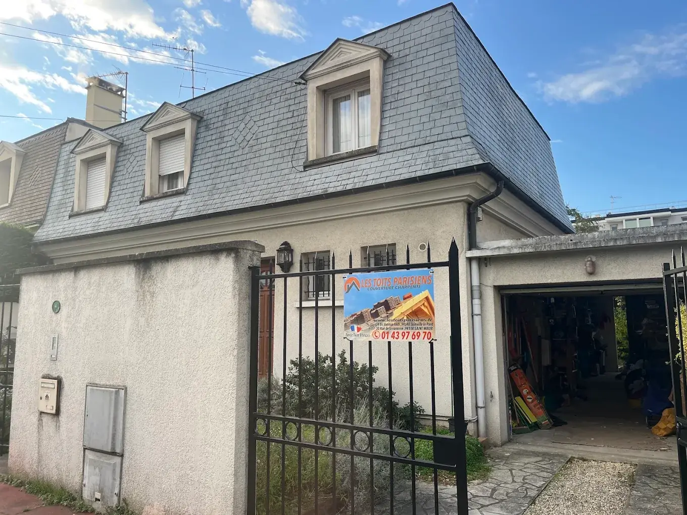 Couverture en ardoise et finitions après intervention